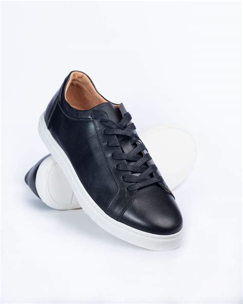 black leather sneaker white sole.